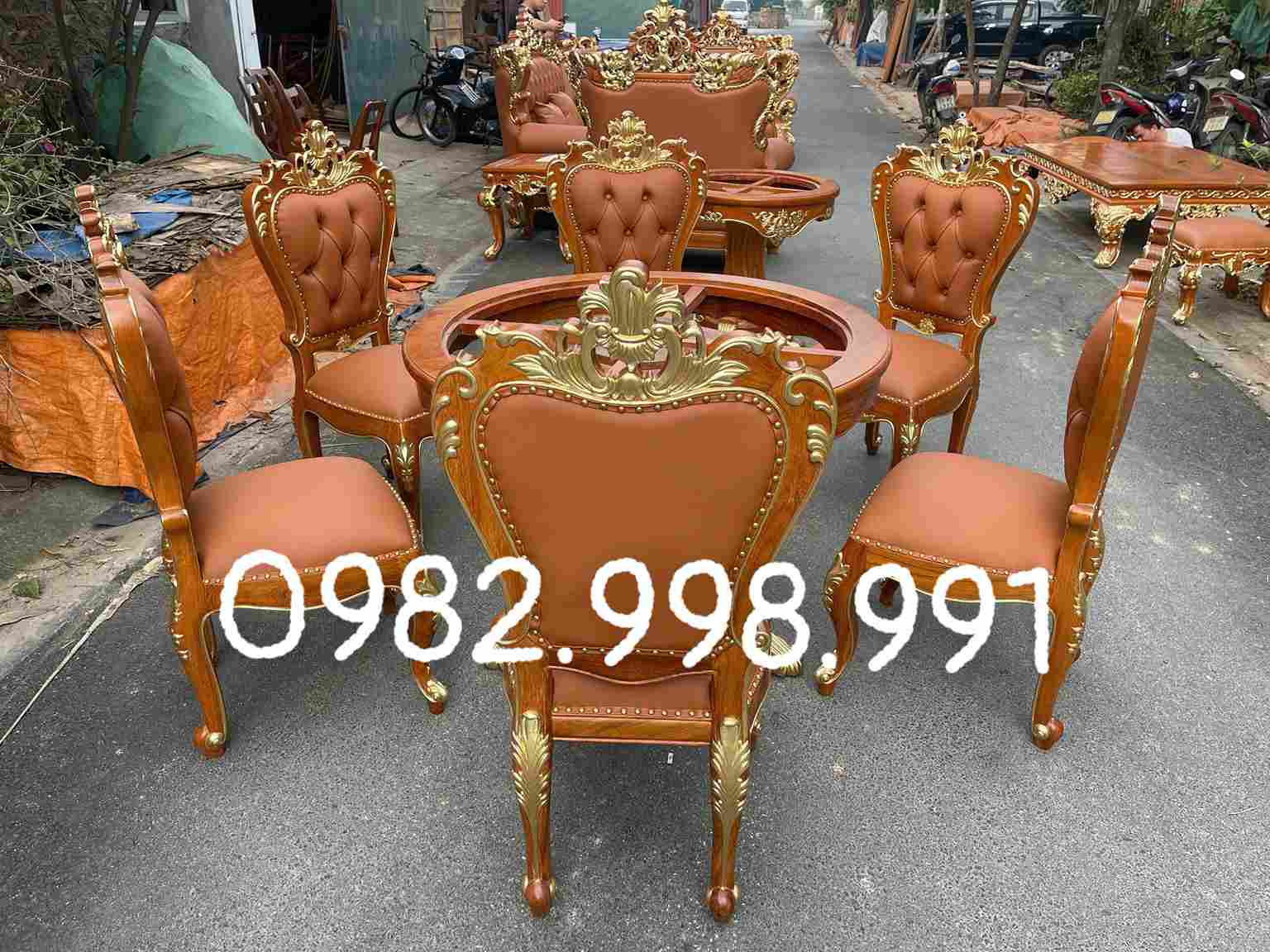 Bộ bàn ăn tròn gỗ gõ 7 món