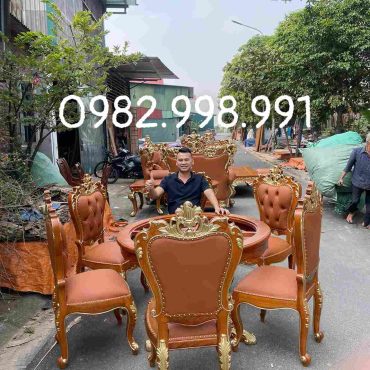 Bộ bàn ăn tròn gỗ gõ 7 món