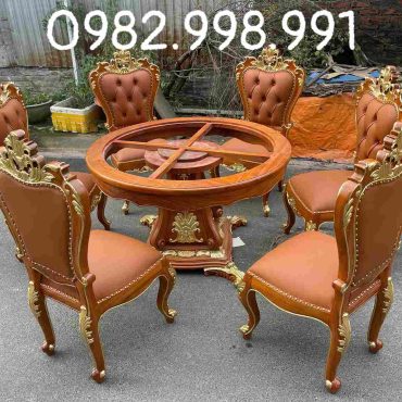 Bộ bàn ăn tròn gỗ gõ 7 món